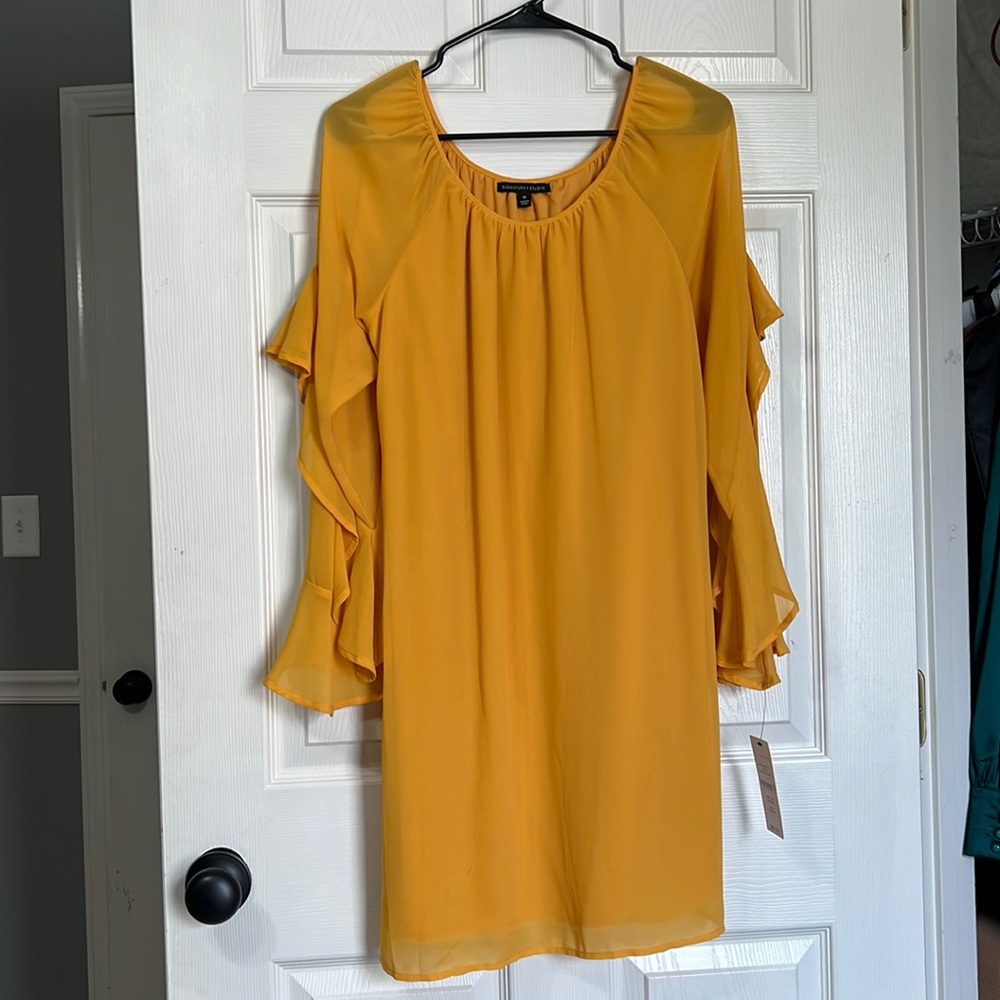 Yellow long sleeve dress by Signature Studio. Never worn, tags still attached.